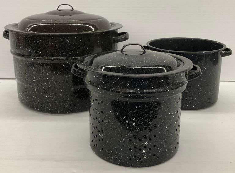 Three Enamelware Stock Pots with Lids and Steamer Basket image