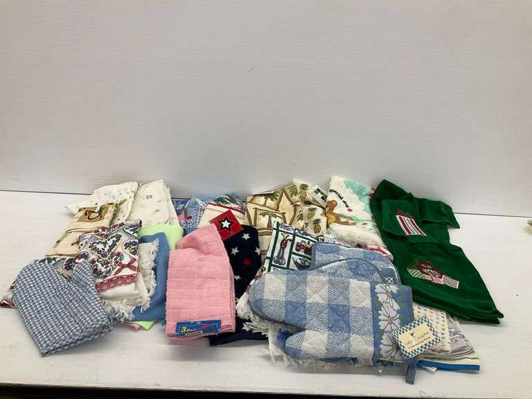 Various Kitchen Towels and Potholders image