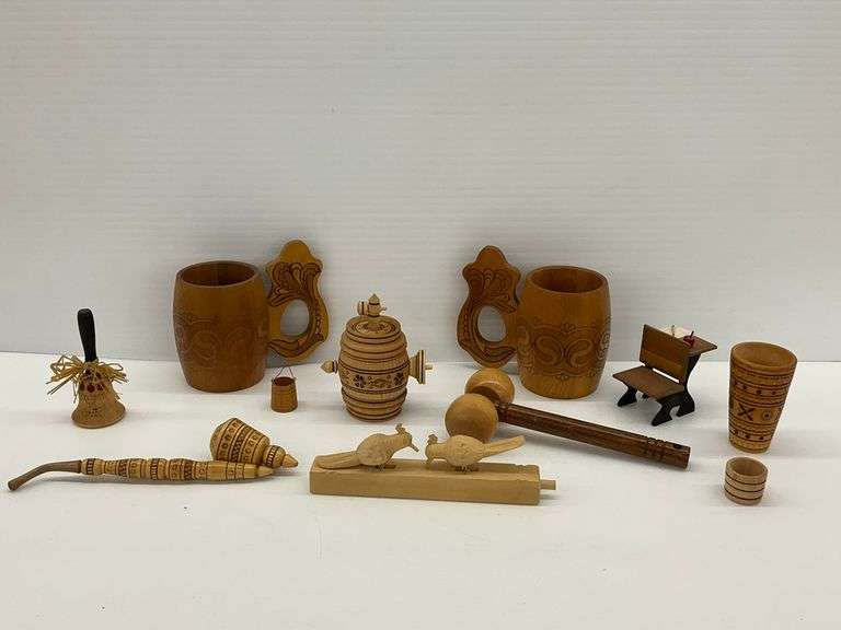 Collection of Wooden Carved Items Including Souvenirs From Russia image