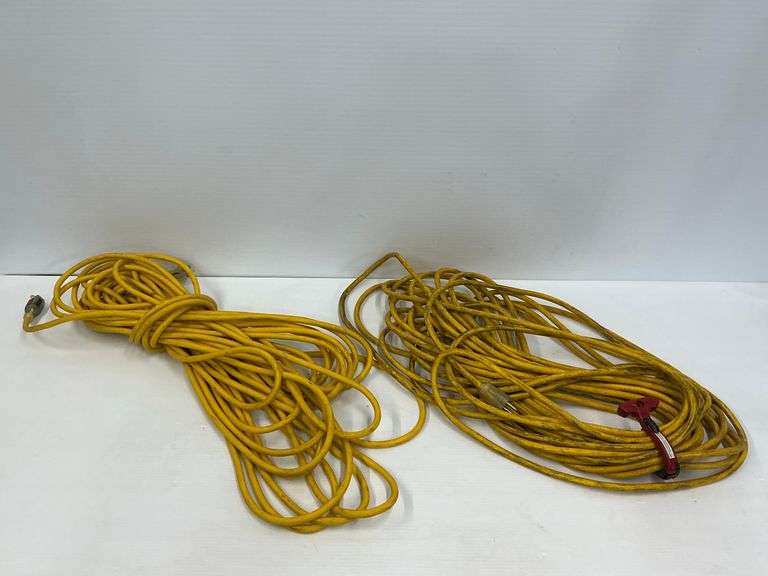 Two Yellow Extension Cords image