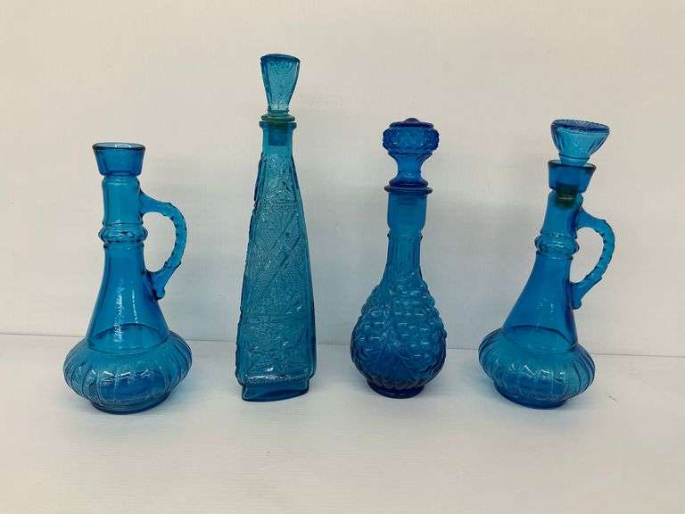 Four Blue Glass Decanters with Stoppers image