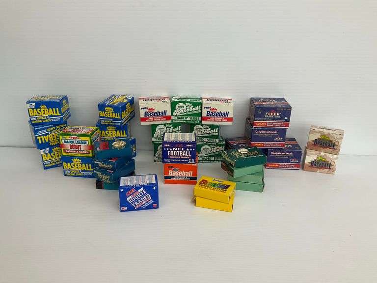 Collection of Baseball and Football Trading Cards and Boxes image