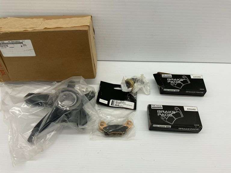 Polaris ATV/UTV Parts Lot: Knuckle, Ball Joint, and Brake Pads image