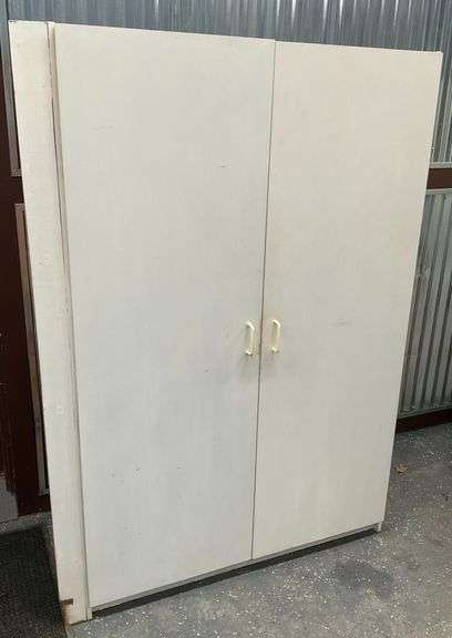 Large White Storage Cabinet with Shelves... Made of Engineered Wood image