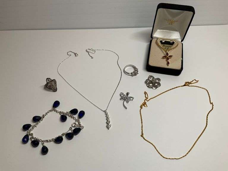 Jewelry Including Necklaces (One Sterling Silver), Rings, and Bracelet. image