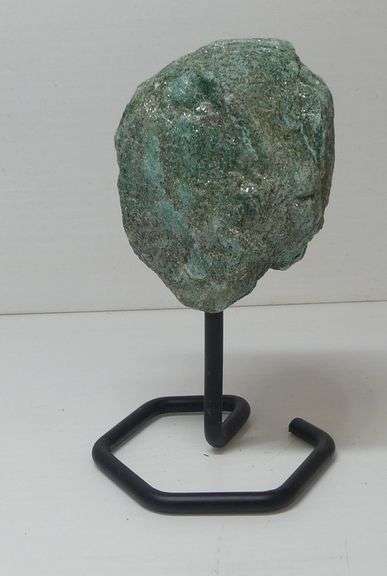 Fuchsite Mineral Specimen on Display Stand image