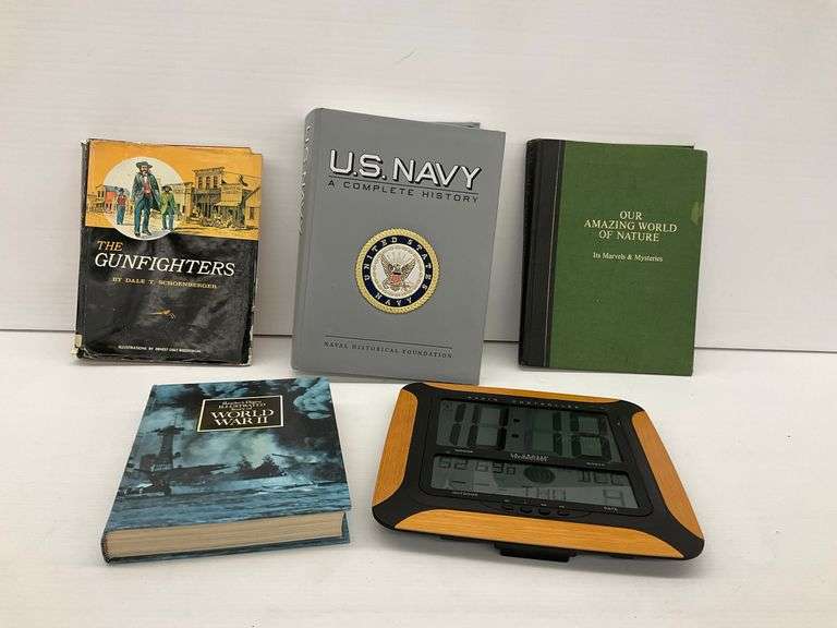 Several Books and a Digital Clock image