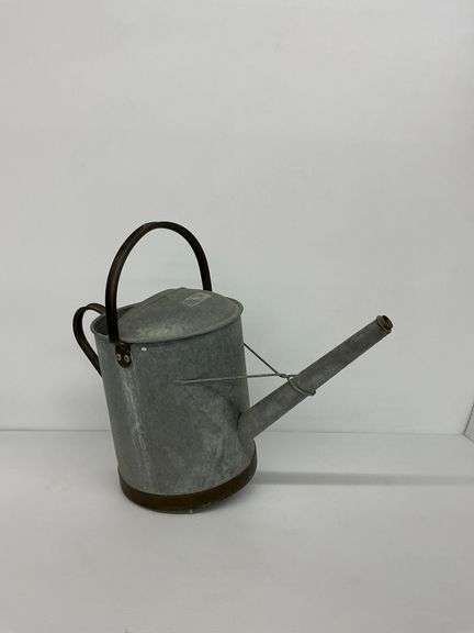 Galvanized Watering Can... bottom is not flat image