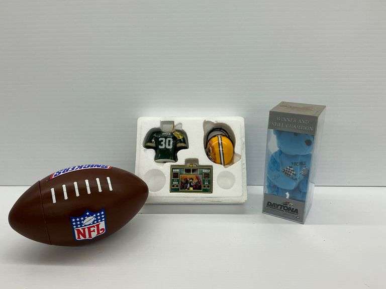 Sports Memorabilia Lot: NFL Snickers Football Container, Packers Ornaments, Daytona Speedway Bear image