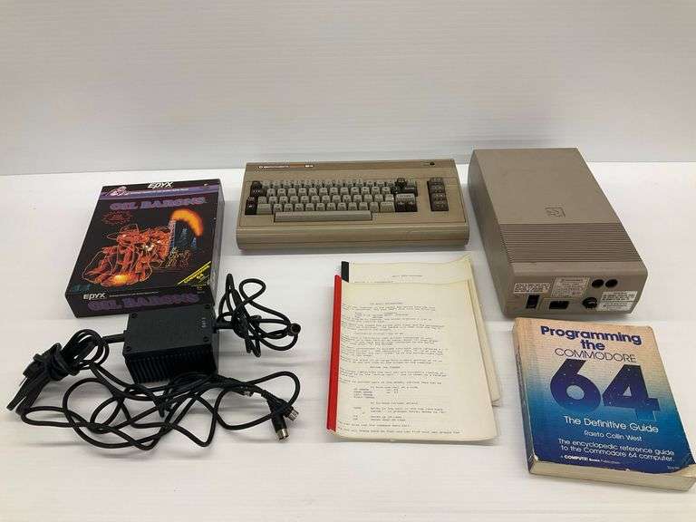 Commodore 64 Computer with Disk Drive (Not Tested), Game, & Manuals... Game Missing Disk image