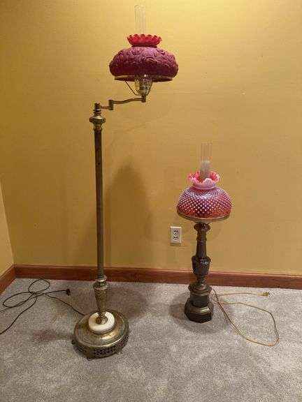 Brass red globed lamps