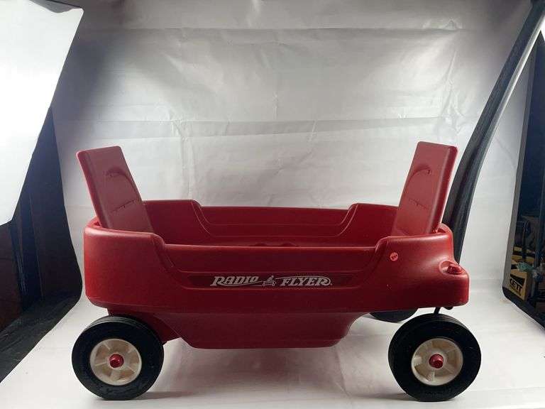Radio Flyer plastic red wagon with seats image