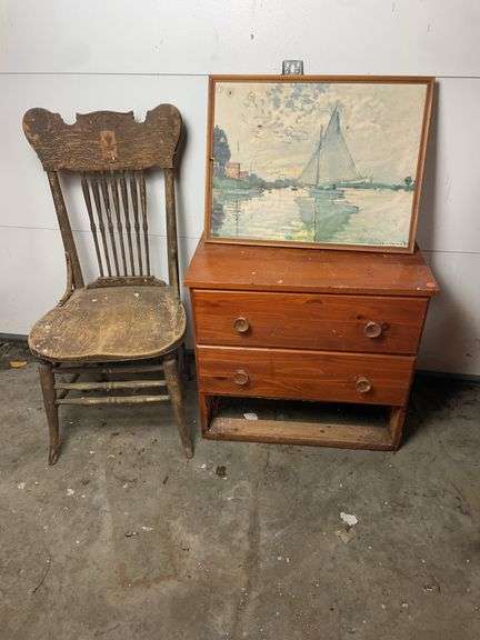 2 drawer table with picture and chair image