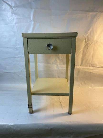 Metal stand table with one drawer image