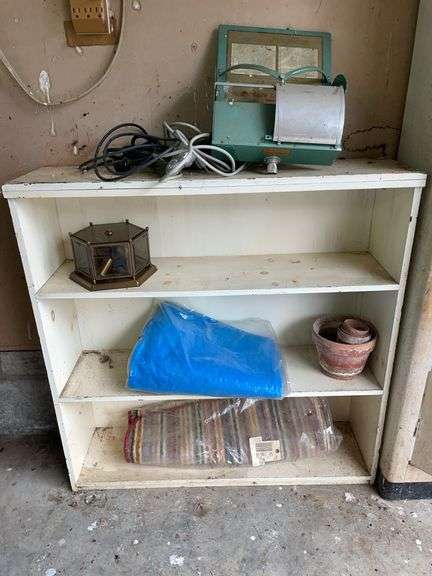 Wooden shelf and contents image