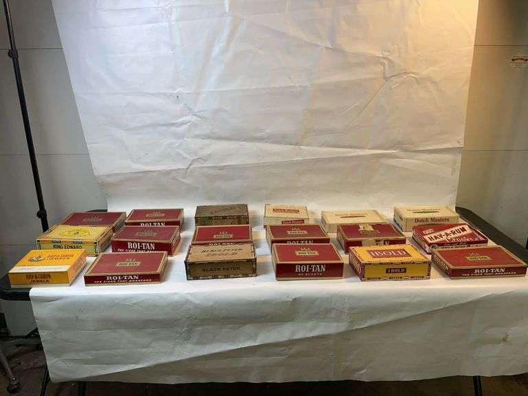 Nuts, bolts and screw assortment on old cigar boxes. image