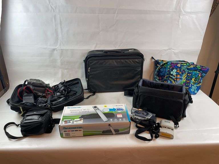 Camcorders, cameras and handheld wand scanner image