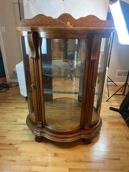 Oak curio cabinet image
