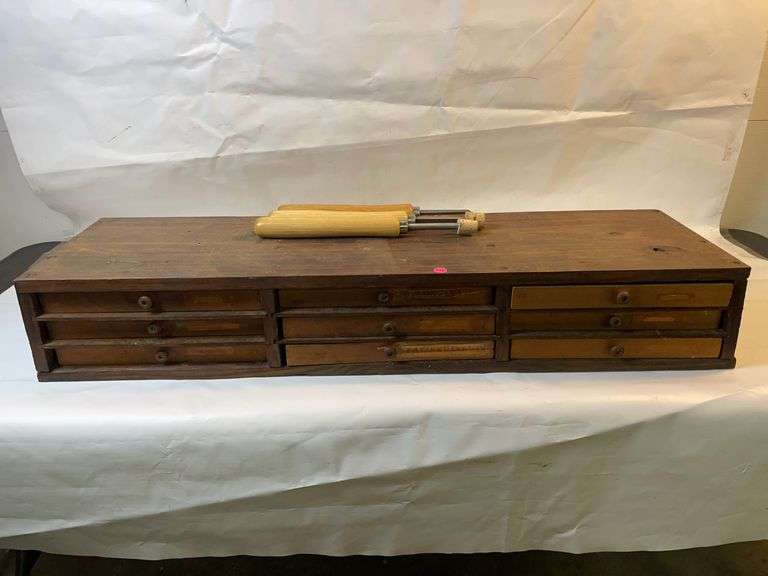 Wooden organizer with all contents. image