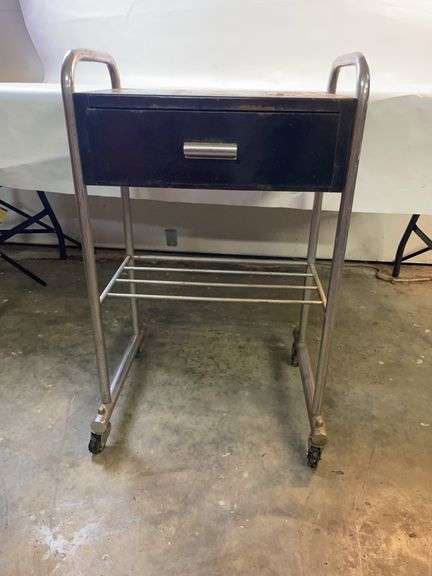 Old metal rolling cart with drawer image