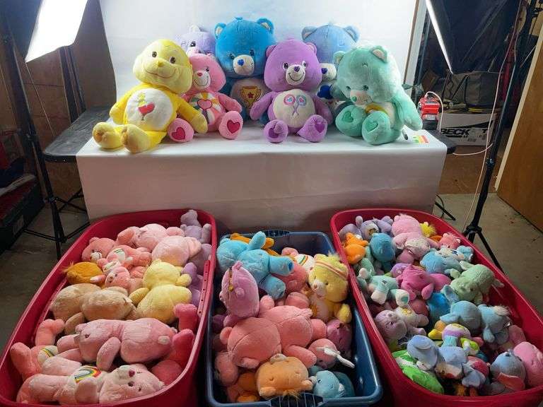 4 huge totes of Care Bears!! Plus you get the totes! image
