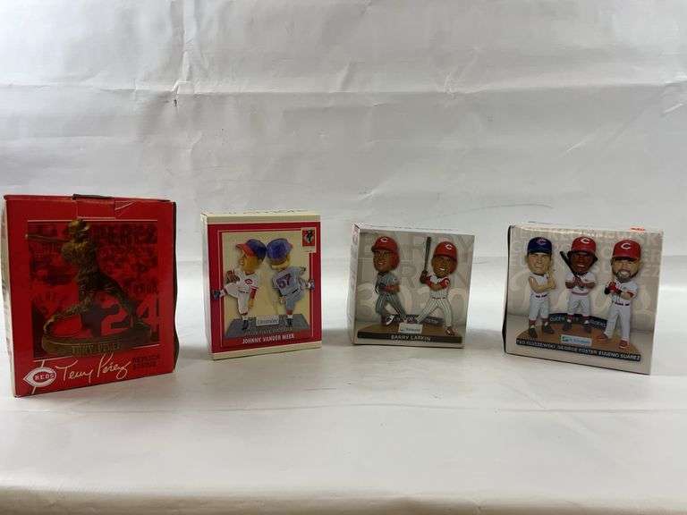 Baseball bobbleheads and statue image