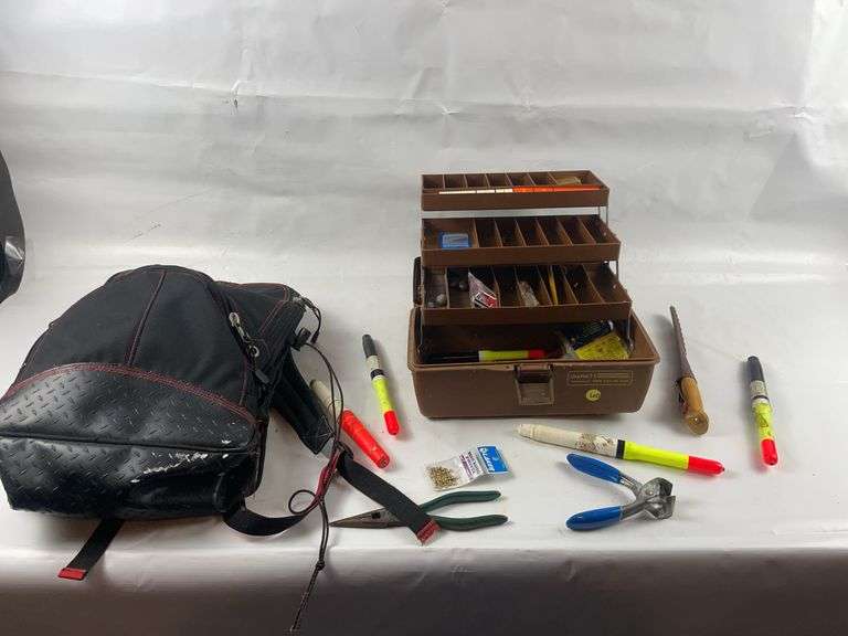 Brown tackle box, fishing backpack and tackle image