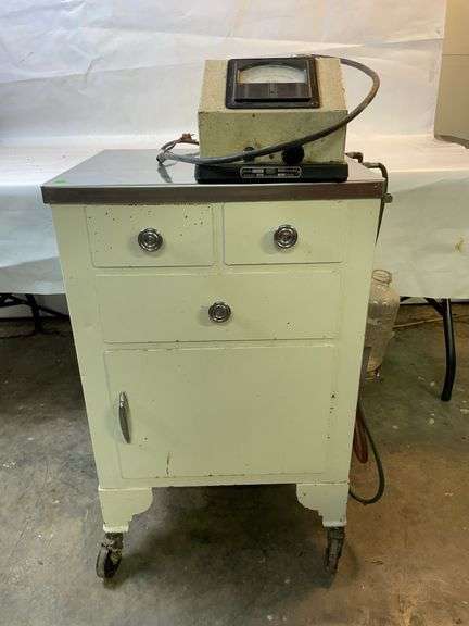 Vintage medical cabinet and contents. image