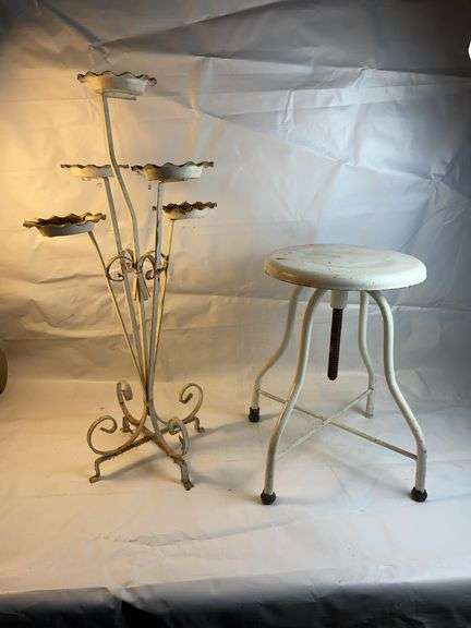 Old metal stool and metal flower pot stand image