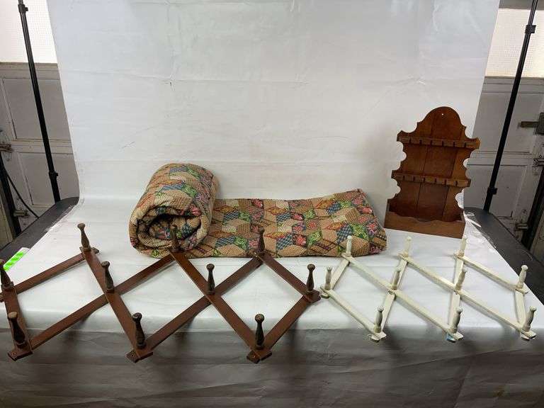 Sleeping bag, 2 wall coat hangers and spoon display image