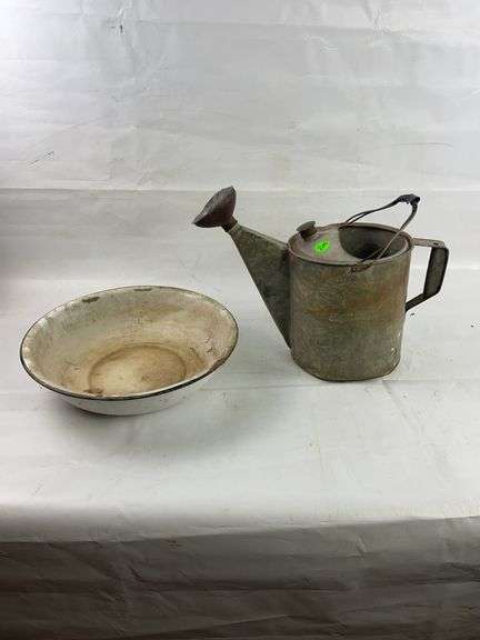 Watering can and granite pan image