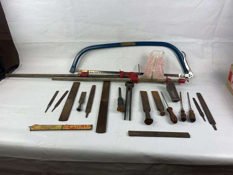 Rasp, filed, bow saw and wood clamps image