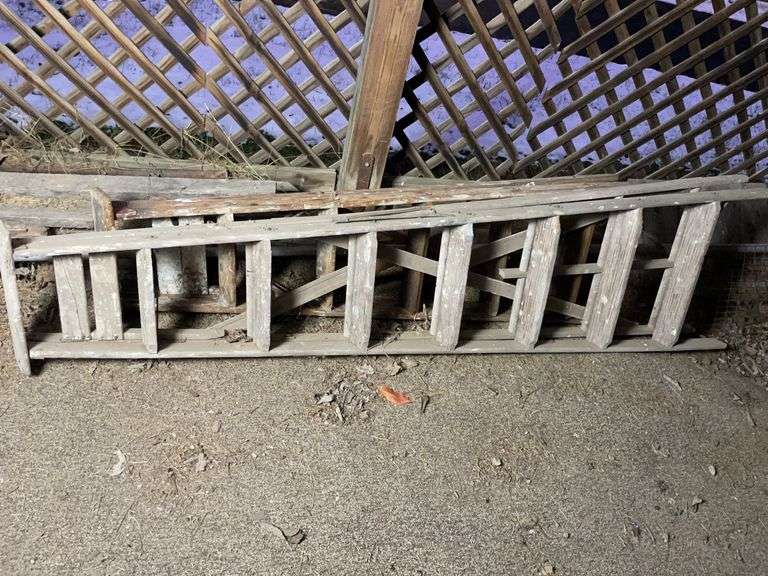 2 wooden ladders image