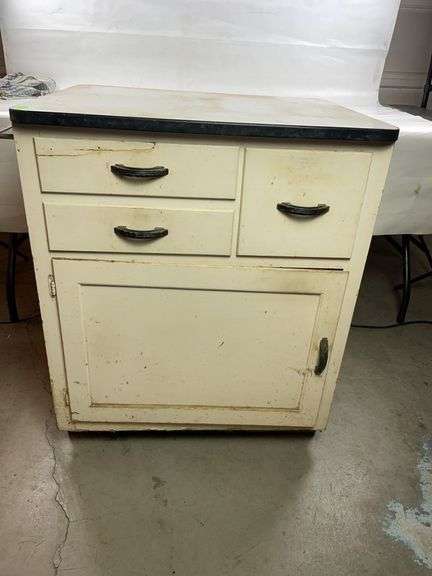 Vintage white porcelain top kitchen cabinet image