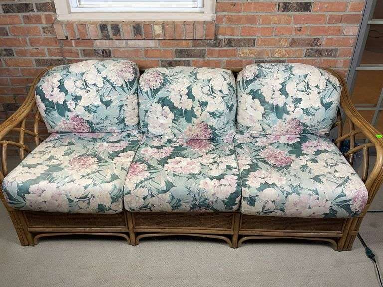 Wicker couch and chair and plant stand image