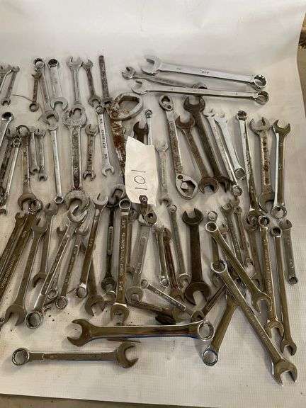 mixed SAE wrenches.