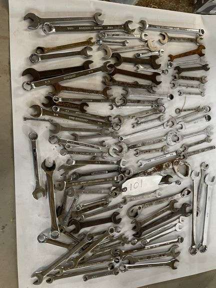 mixed SAE wrenches. image