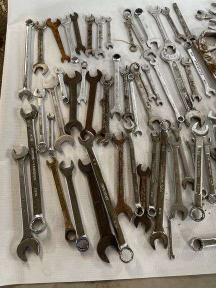 mixed SAE wrenches.