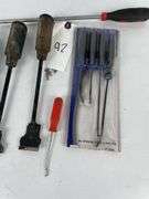 Scrapers, picks, retaining clip removers
