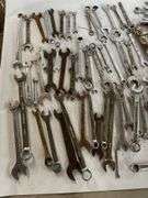 mixed SAE wrenches.