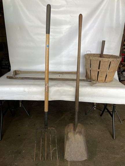 Garden Tool Collection: Crowbar, Pitchfork, Shovel, and Orchard Basket image
