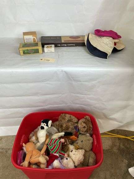 Tote of Stuffed Animals, Hats, and Household Items
