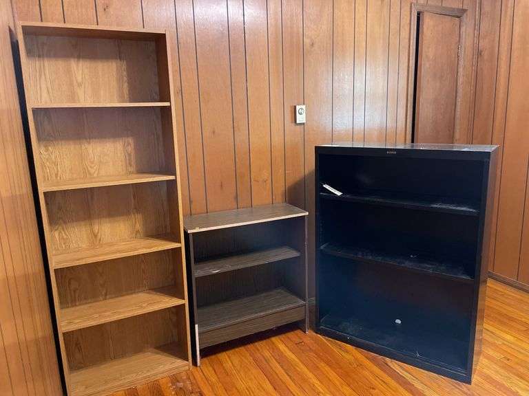 Three Shelf Units: Wooden, Particle Board, and Metal