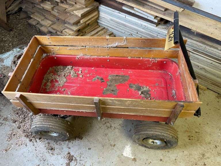 Red Wagon with Wooden Sides and Large Tires image