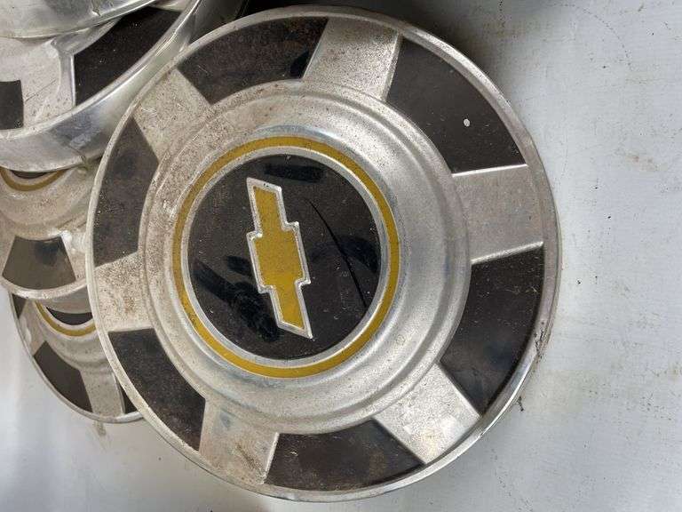 Lot of 7 Chevrolet Hubcaps