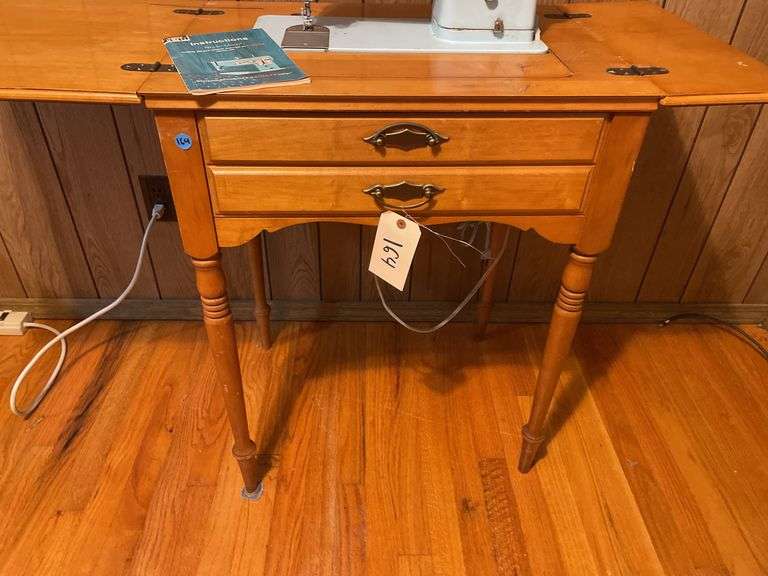 Singer Sewing Machine with Wooden Cabinet and Manual