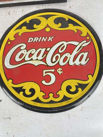 Two Metal Coca-Cola Advertising Signs