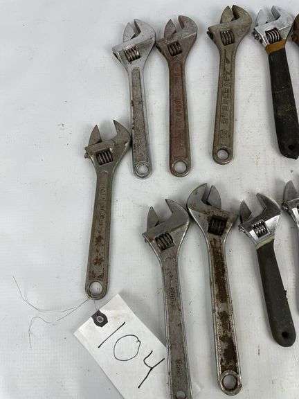 Adjustable wrenches