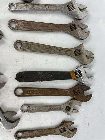 Adjustable wrenches