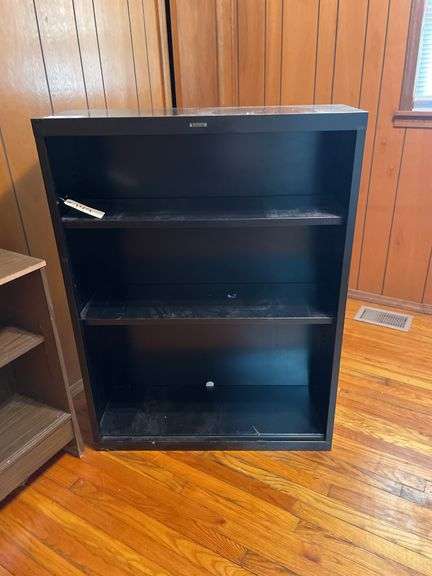 Three Shelf Units: Wooden, Particle Board, and Metal